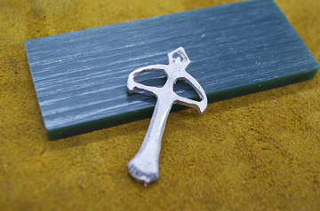 Cast crossbow, and the original lost wax block. 